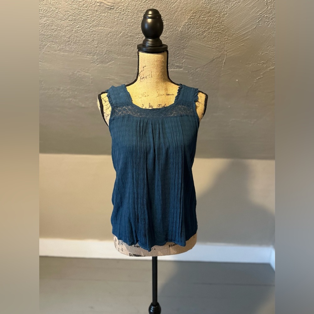 Maurice’s tank. Worn once. Great condition.